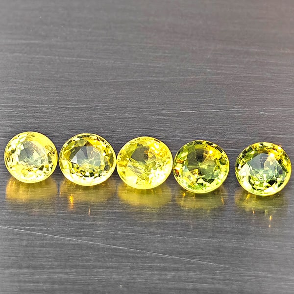 Natural Greenish Yellow Titanium Sphene Gemstones Rainbow Spark 1.15 Ct. 5 Pcs. Round Shape 3.8 Mm.: Product ID: 806509452 Product Name: Natural Sphene Weight: 1.15 CT. Size: 3.8 x 3.8 x 2.3 MM. Shape: Round Shape Color: Greenish Yellow Titanium Rainbow Spark Clarity:SI1 Luster: Good Gems Origin: Mad