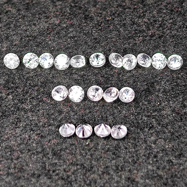 Natural White Zircon Gemstones 0.40 Ct. 20 Pcs. Round Diamond Cut 1.4 Mm.: Product ID: 807743150 Product Name: Natural Zircon Weight: 0.40 CT. Size: 1.4 x 1.4 x 1.1 MM. Shape: Round Diamond Cut Color: White Clarity:VSI Luster: Good Gems Origin: Cambodia Treatment: Heated Cry