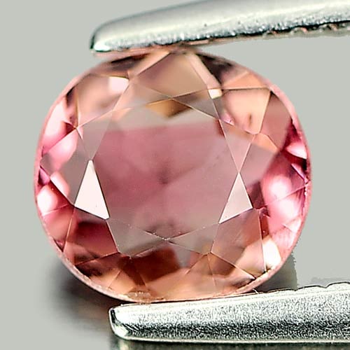 Natural Party Color Tourmaline Gemstones 0.57 Ct. Oval Shape 5.7 x 5.4 Mm.: Product ID: 807246449 Product Name: Natural Tourmaline Weight: 0.57 CT. Size: 5.7 x 5.4 x 2.7 MM. Shape: Oval Color: Bi Color Clarity:VSI Luster: Good Gems Origin: Nigeria Treatment: Unheated Crystal 