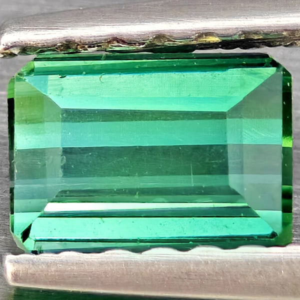 Natural Green Tourmaline Gemstones 0.71 Ct. Octagon Shape 5.5 x 4 Mm.: Product ID: 807251145 Product Name: Natural Tourmaline Weight: 0.71 CT. Size: 5.5 x 4 x 3.5 MM. Shape: Octagon Color: Green Clarity:SI1 Luster: Good Gems Origin: Nigeria Treatment: Unheated Crystal St