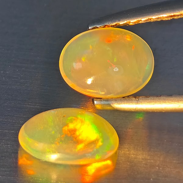 Natural Multi-Color Opal Gemstones 0.97 Ct. 2 Pcs. Oval Cabochon Shape 7.2 x 5.3 Mm. (1 of 3)