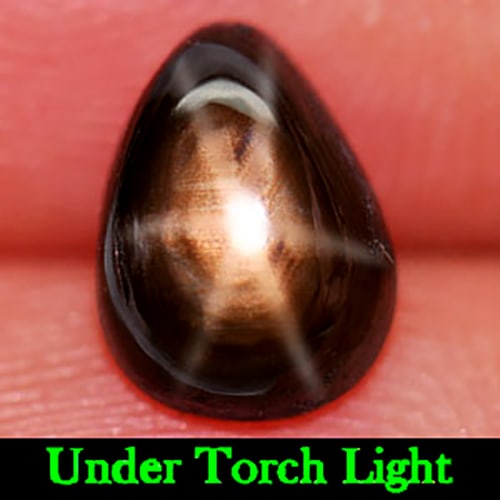 Natural Black Star Sapphire Gemstones 2.10 Ct. Pear Cabochon Shape 8.2 x 6.1 Mm.: Product ID: 806146126 Product Name: Natural Star Sapphire Weight: 2.10 CT. Size: 8.2 x 6.1 x 3.7 MM. Shape: Pear Cabochon Color: Black Clarity:Opaque Luster: Good 6 Rays Star Gems Origin: Thailand Tre