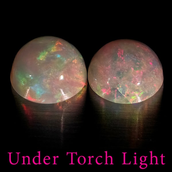 Natural Multi Color Opal Gemstones 1.96 Ct. 2 Pcs. Round Cabochon Shape 7.1 Mm.: Product ID: 818728233 Product Name: Natural Opal Weight: 1.92 CT. Size: 7.1 x 7.1 x 3.7 MM. Shape: Round Cabochon Color: Multi-Color Clarity:Semi - Transparent Luster: Good Gems Origin: Ethiopia Treat