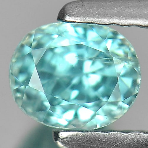 Natural Blue Zircon Gemstones 1.08 Ct. Oval Shape 5.3 x 4.4 Mm.: Product ID: 807721443 Product Name: Natural Zircon Weight: 1.08 CT. Size: 5.3 x 4.4 x 4.5 MM. Shape: Oval Color: Blue Clarity:VSI - SI Luster: Good Gems Origin: Cambodia Treatment: Heated Crystal Stru
