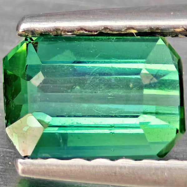 Natural Green Tourmaline Gemstones 0.98 Ct. Octagon Shape 6.5 x 4.5 Mm.: Product ID: 807251127 Product Name: Natural Tourmaline Weight: 0.98 CT. Size: 6.5 x 4.5 x 3.9 MM. Shape: Octagon Color: Green Clarity:SI1 Luster: Good Gems Origin: Nigeria Treatment: Unheated Crystal 