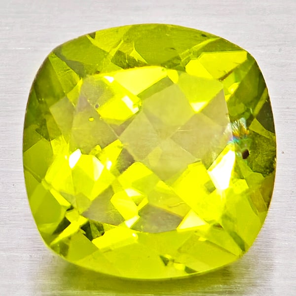 Natural Green Peridot Gemstones 1.64 Ct. Cushion Shape 7.2 x 7.1 Mm.: Product ID: 805317228 Product Name: Natural Peridot Weight: 1.64 CT. Size: 7.2 x 7.1 x 4.5 MM. Shape: Cushion Shape Color: Green Clarity:VSI - SI1 Luster: Good Gems Origin: Pakistan Treatment: Unheate