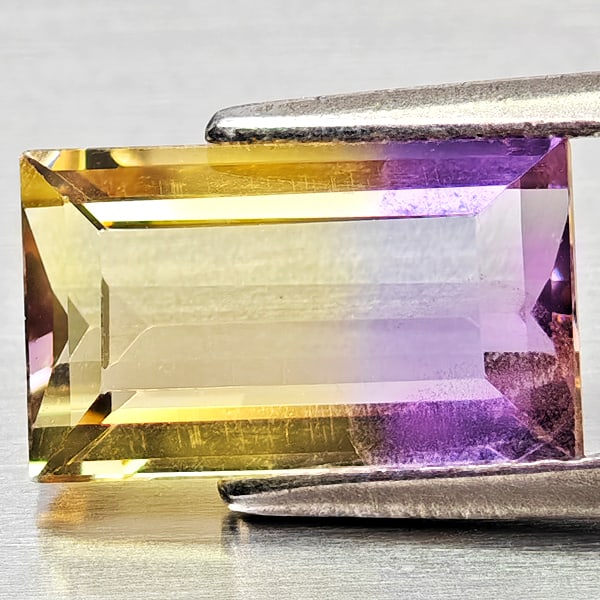 Natural Bi Color Ametrine Gemstones 2.12 Ct. Octagon Shape 10.2 x 6.2 Mm.: Product ID: 800408345 Product Name: Natural Ametrine Weight: 2.12 CT. Size: 10.2 x 6.2 x 4.2 MM. Shape: Octagon Color: Bi Color Clarity:VSI - SI1 Luster: Good Gems Origin: Bolivia Treatment: Unheated 