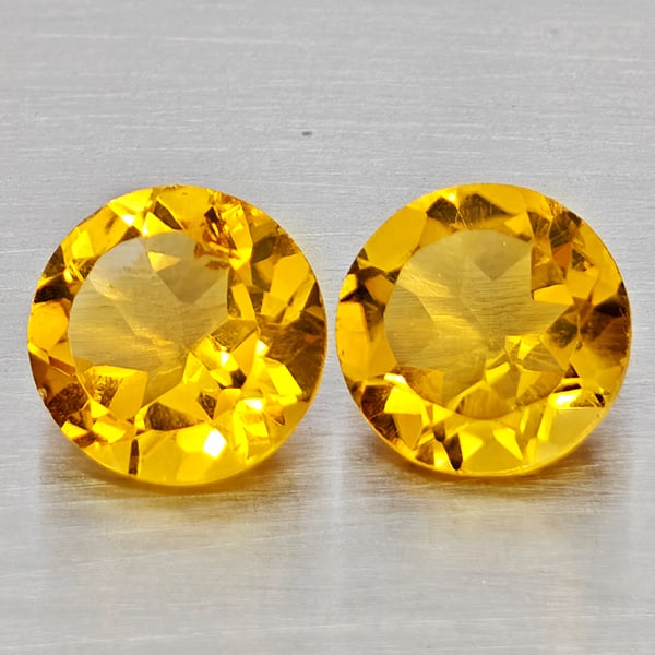 Natural Yellow Citrine Gemstones 2.35 Ct. 2 Pcs Round Shape 7.1 Mm.: Product ID: 801815351 Product Name: Natural Citrine Weight: 2.35 CT. Size: 7.1 x 7.1 x 4.2 MM. Shape: Round Shape Color: Yellow Clarity:VSI - SI1 Luster: Good Gems Origin: Brazil Treatment: Unheated C