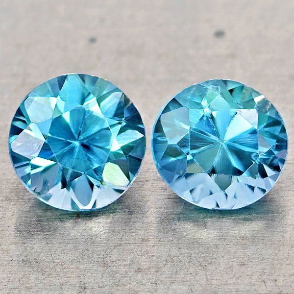 Natural Blue Zircon Gemstones 1.48 Ct. 2 Pcs. Round Diamond Cut 5.1 Mm.: Product ID: 807743031 Product Name: Natural Zircon Weight: 1.48 CT. Size: 5.1 x 5.1 x 3.6 MM. Shape: Round Diamond Cut Color: Blue Clarity:VSI Luster: Good Gems Origin: Cambodia Treatment: Heated Crys