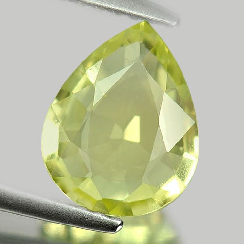 Natural Greenish Yellow Chrysoberyl Gemstones 1.53 Ct. Pear Shape 9 x 7.2 Mm.: Product ID: 801701100 Product Name: Natural Chrysoberyl Weight: 1.53 CT. Size: 9 x 7.2 x 2.8 MM. Shape: Pear Color: Yellow Clarity:VSI Luster: Good Gems Origin: Madagascar Treatment: Unheated Crystal 