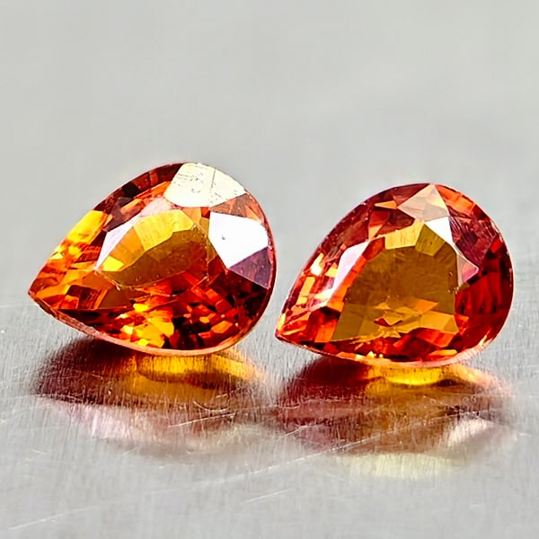 Natural Orange Red Songea Sapphire Gemstones 1.00 Ct. 2 Pcs. Pear Shape 5.1 x 4 Mm.: Product ID: 806161875 Product Name: Natural Orange Sapphire Weight: 1.00 CT. Size: 5.1 x 4 x 2.7 MM. Shape: Pear Color: Orange Red Songea Clarity:VVS Luster: Very Good Gems Origin: Tanzania Treatment: