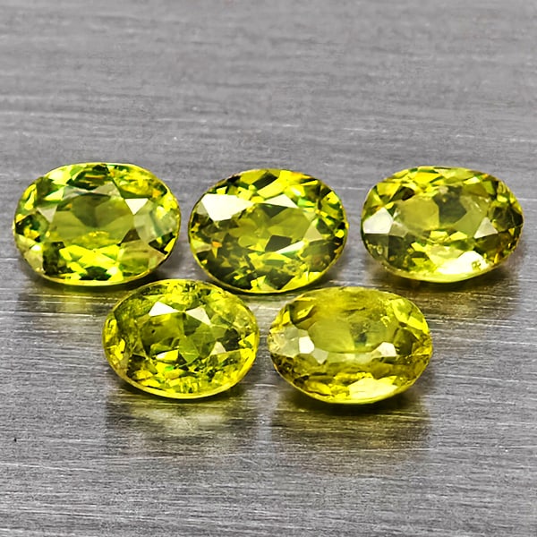 Natural Green Demantiod Garnet Gemstones 1.36 Ct. 5 Pcs. Oval Shape 4 x 3.2 Mm.: Product ID: 802937582 Product Name: Natural Demantoid Weight: 1.36 CT. Size: 4 x 3.2 x 2.5 MM. Shape: Oval Color: Green Clarity:SI1 Luster: Good Gems Origin: Madagascar Treatment: Unheated Crystal Str