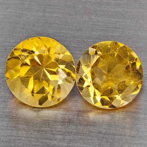 Natural Yellow Citrine Gemstones 2.36 Ct. 2 Pcs. Round Shape 7 Mm.: Product ID: 801815515 Product Name: Natural Citrine Weight: 2.36 CT. Size: 7 x 7 x 4 MM. Shape: Round Shape Color: Yellow Clarity:VSI Luster: Good Gems Origin: Brazil Treatment: Unheated Crystal Struc