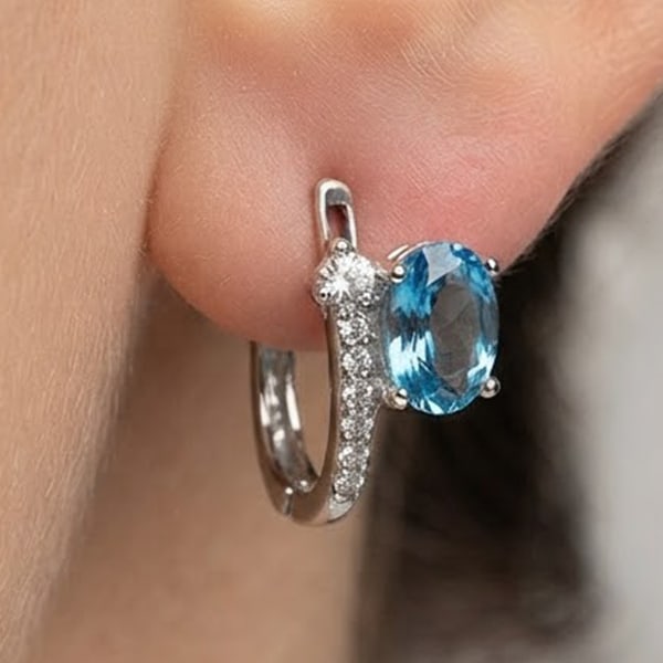 Natural Swiss Blue Topaz Gemstones 925 Sterling Silver 4.38 Grams Earrings: Product ID: 207103201 Product Type: 925 Sterling Silver Fine Jewelry Jewelry Weight: 4.38 Grams. Gemstones Color: Blue Metal: Solid Silver 92.5%. Gemstone Detail: Oval Blue Natural Topaz Size 8 x 6 Mm