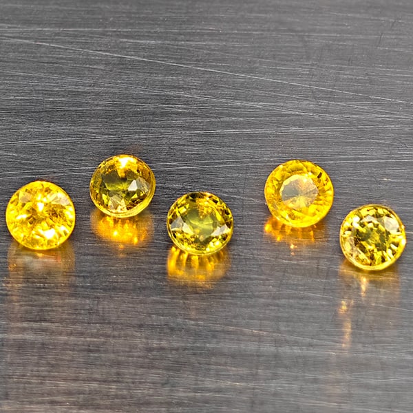 Natural Greenish Yellow Titanium Sphene Gemstones Rainbow Spark 1.10 Ct. 5 Pcs. Round Shape 3.4 Mm.: Product ID: 806509426 Product Name: Natural Sphene Weight: 1.10 CT. Size: 3.4 x 3.4 x 2.3 MM. Shape: Round Color: Greenish Yellow Titanium Rainbow Spark Clarity:SI1 Luster: Good Gems Origin: Madagasca