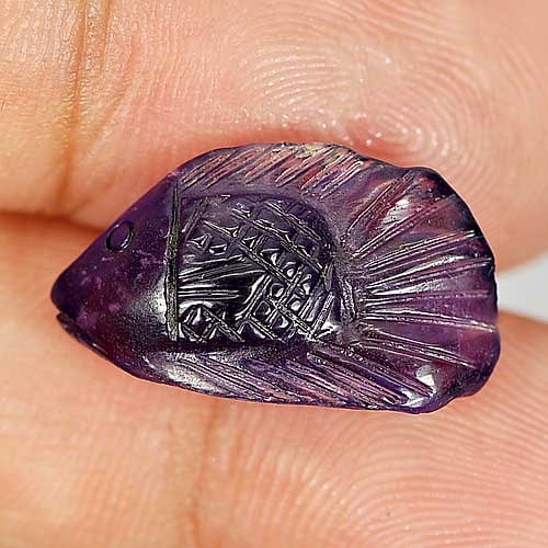 Natural Violet Amethyst Gemstones 7.54 Ct. Fish Carving Shape 18.6 x 10.7 Mm.: Product ID: 810303522 Product Name: Natural Amethyst Weight: 7.54 CT. Size: 18.6 x 10.7 x 7.1 MM. Shape: Fish Carving Color: Violet Clarity:Semi - Transparent Luster: Good Gems Origin: Brazil Treatmen