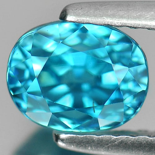 Natural Blue Zircon Gemstones 2.38 Ct. Oval Shape 6.9 x 5.4 Mm.: Product ID: 807720922 Product Name: Natural Zircon Weight: 2.38 CT. Size: 6.9 x 5.4 x 5.8 MM. Shape: Oval Color: Blue Clarity:VVS Luster: Very Good Gems Origin: Cambodia Treatment: Heated Crystal Stru