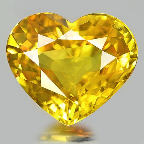 Natural Yellow Sapphire Gemstones 5.11 Ct. Heart Shape 10.27 x 12.00 Mm.: Product ID: 806148759 Product Name: Natural Yellow Sapphire Weight: 5.11 CT. Size: 10.27 x 12.00 x 5.31 MM. Shape: Heart Color: Yellow Clarity:VSI Luster: Very Good Gems Origin: Thailand Treatment: He