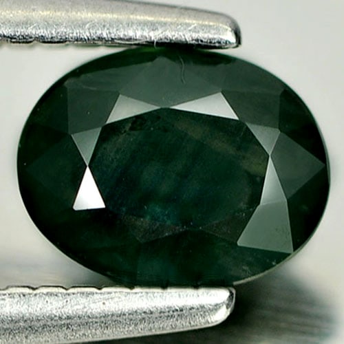 Natural Green Sapphire Gemstones 0.70 Ct. Oval Shape 5.9 x 4.6 Mm.: Product ID: 806157876 Product Name: Natural Green Sapphire Weight: 0.70 CT. Size: 5.9 x 4.6 x 2.9 MM. Shape: Oval Color: Green Clarity:VSI Luster: Good Gems Origin: Thailand Treatment: Heated Crystal 