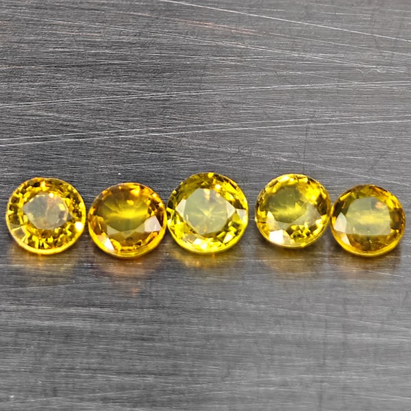 Natural Greenish Yellow Titanium Sphene Gemstones Rainbow Spark 1.14 Ct. 5 Pcs. Round Shape 3.7 Mm.: Product ID: 806509420 Product Name: Natural Sphene Weight: 1.14 CT. Size: 3.7 x 3.7 x 2.2 MM. Shape: Round Color: Greenish Yellow Titanium Rainbow Spark Clarity:SI1 Luster: Good Gems Origin: Madagasca