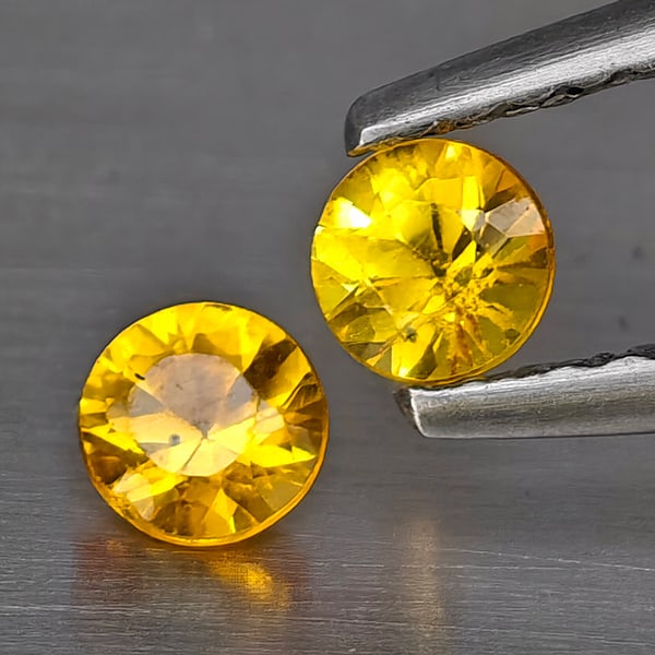 Natural Yellow Songea Sapphire Gemstones 0.40 Ct. 2 Pcs. Round Diamond Cut 3.5 Mm.: Product ID: 806130504 Product Name: Natural Blue Sapphire Weight: 0.40 CT. Size: 3.5 x 3.5 x 2.5 MM. Shape: Round Diamond Cut Color: Yellow Clarity:VSI Luster: Good Gems Origin: Tanzania Treatment: He