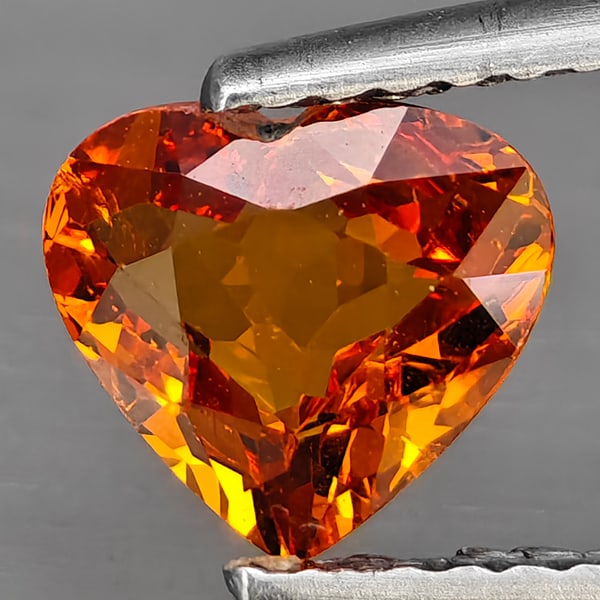 Natural Reddish Orange Spessartine Garnet Gemstones 1.27 Ct. Heart Shape 7.2 x 6.4 Mm: Product ID: 802937853 Product Name: Natural Spessartine Weight: 1.27 CT. Size: 7.2 x 6.4 x 3.4 MM. Shape: Heart Shape Color: Reddish Orange Clarity:SI1 Luster: Very Good Gems Origin: Namibia Treatment