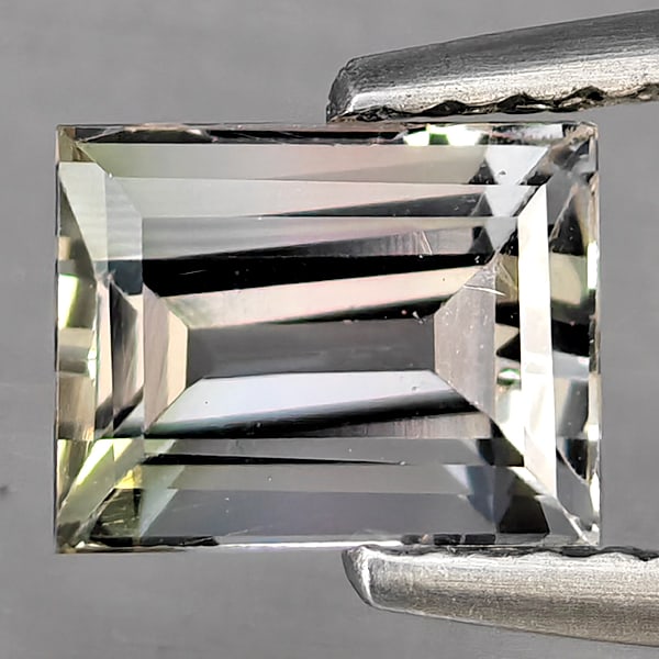 Natural Party Color Tourmaline Gemstones 1.31 Ct. Baguette Shape 6.8 X 5.3 Mm.: Product ID: 107200633 Product Name: Natural Tourmaline Weight: 1.31 CT. Size: 6.8 X 5.3 X 4.1 MM. Shape: Baguette Color: Party Color Clarity:VVS Luster: Good Gems Origin: Nigeria Treatment: Unheated C