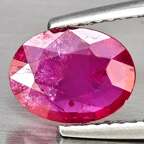 Natural Purplish Red Ruby Gemstones 1.34 Ct. Oval Shape 8.9 x 6.7 Mm.: Product ID: 805917583 Product Name: Natural Ruby Weight: 1.34 CT. Size: 8.9 x 6.7 x 2.2 MM. Shape: Oval Color: Purplish Red Clarity:VSI Luster: Good Gems Origin: Mozambique Treatment: Heated (Lead-gla