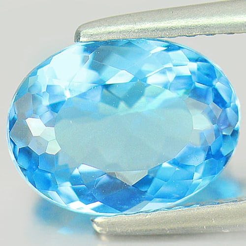 Natural Swiss Blue Topaz Gemstones 2.93 Ct. Oval Shape 10.4 x 7.9 Mm.: Product ID: 807155371 Product Name: Natural Blue Topaz Weight: 2.93 CT. Size: 10.4 x 7.9 x 4.6 MM. Shape: Oval Color: Swiss Blue Clarity:VVS Luster: Good Gems Origin: Brazil Treatment: Treated Crystal