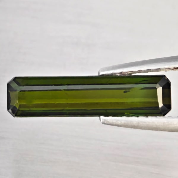 Natural Green Tourmaline Gemstones 2.02 Ct. Octagon Shape 15.8 x 4 Mm.: Product ID: 807251610 Product Name: Natural Tourmaline Weight: 2.02 CT. Size: 15.8 x 4 x 3.3 MM. Shape: Octagon Color: Green Clarity:SI Luster: Good Gems Origin: Nigeria Treatment: Unheated Crystal St