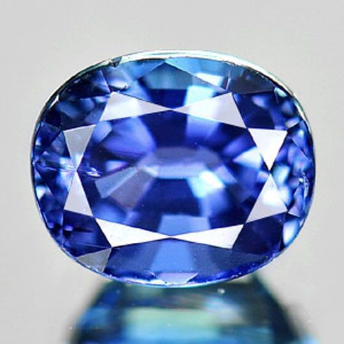 Natural Blue Tanzanite Gemstones 1.35 Ct. Oval Shape 6.6 x 5.5 Mm.: Product ID: 807009146 Product Name: Natural Tanzanite Weight: 1.35 CT. Size: 6.6 x 5.5 x 4.5 MM. Shape: Oval Color: Blue Clarity:VSI Luster: Very Good Gems Origin: Tanzania Treatment: Heated Crystal S