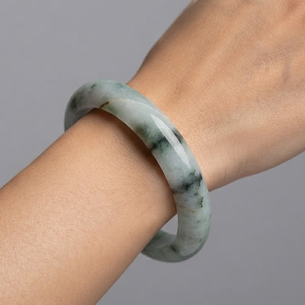 Natural Multi Color Green Jade Bangle Gemstones 279.50 Ct. Diameter 55 Mm.: Product ID: 819816313 Product Name: Natural Jade Weight: 279.50 CT. Size: 65 x 55 MM. Shape: Round Shape Color: Multi-Color Clarity:Opaque Luster: None Gems Origin: Thailand Treatment: Unheated Crysta