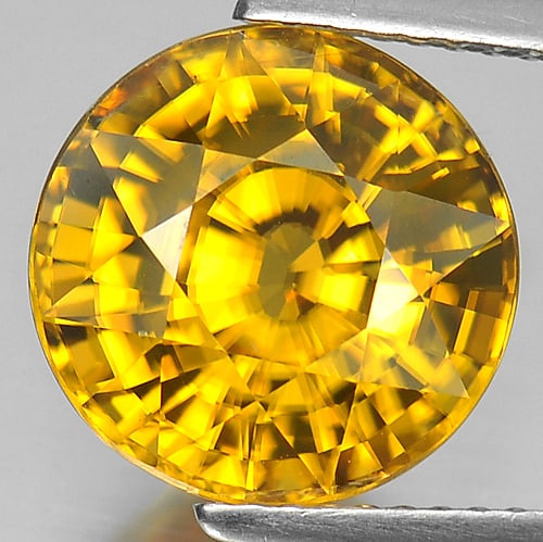 Natural Yellow Zircon Gemstone 8.96 Ct. Round Shape Size 11.2 Mm.: Product ID: 807726519 Product Name: Natural Zircon Weight: 8.96 CT. Size: 11.2 x 11.2 x 7.6 MM. Shape: Round Color: Yellow Clarity:VVS Luster: Very Good Gems Origin: Cambodia Treatment: Heated Crystal