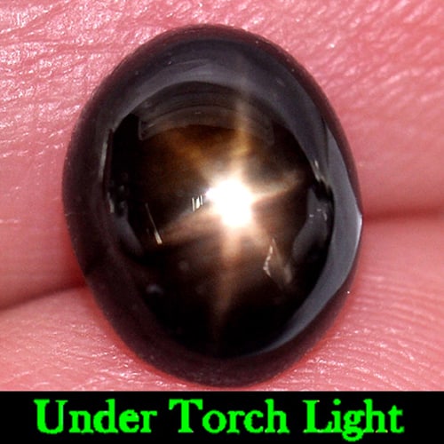Natural Black Star Sapphire Gemstones 6 Rays 3.35 Ct. Oval Cabochon Shape 9.3 x 7.5 Mm.: Product ID: 806136664 Product Name: Natural Star Sapphire Weight: 3.35 CT. Size: 9.3 x 7.5 x 4.4 MM. Shape: Oval Cabochon Color: Black Clarity:Opaque Luster: Good 6 Rays Star Gems Origin: Thailand Tre