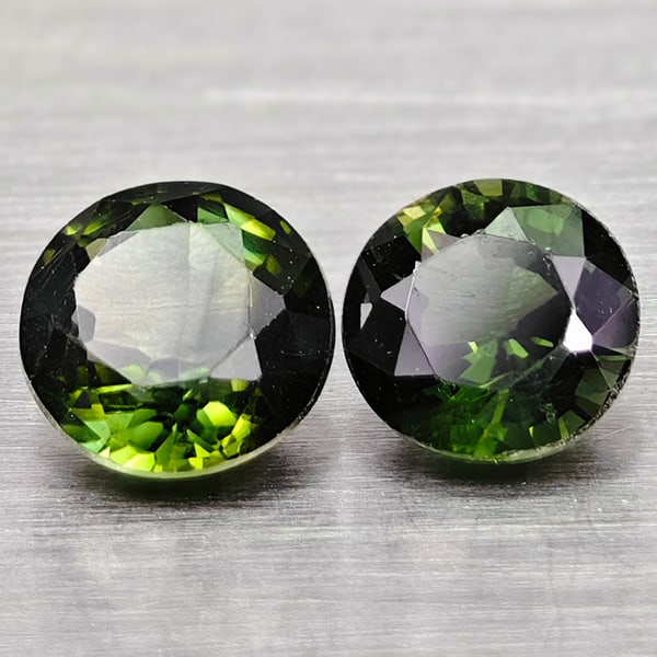 Natural Party Color Green Tourmaline Gemstones 1.02 Ct. 2 Pcs. Round Shape 5 Mm.: Product ID: 807250754 Product Name: Natural Tourmaline Weight: 1.02 CT. Size: 5 x 5 x 3.2 MM. Shape: Round Color: Party Color Green Clarity:VSI Luster: Good Gems Origin: Nigeria Treatment: Unheated Cr