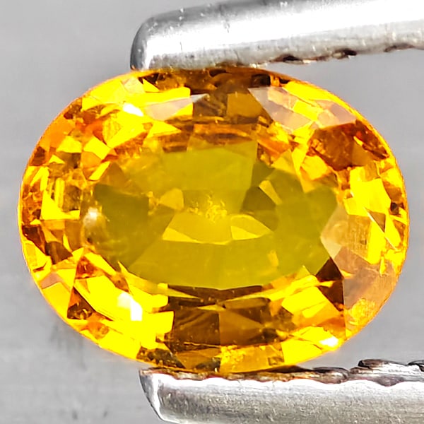 Natural Yellow Sapphire Gemstones 0.61 Ct. Oval Shape 6 x 4.8 Mm.: Product ID: 806163024 Product Name: Natural Yellow Sapphire Weight: 0.61 CT. Size: 6 x 4.8 x 2.5 MM. Shape: Oval Color: Yellow Clarity:SI1 Luster: Good Gems Origin: Thailand Treatment: Heated Crystal 