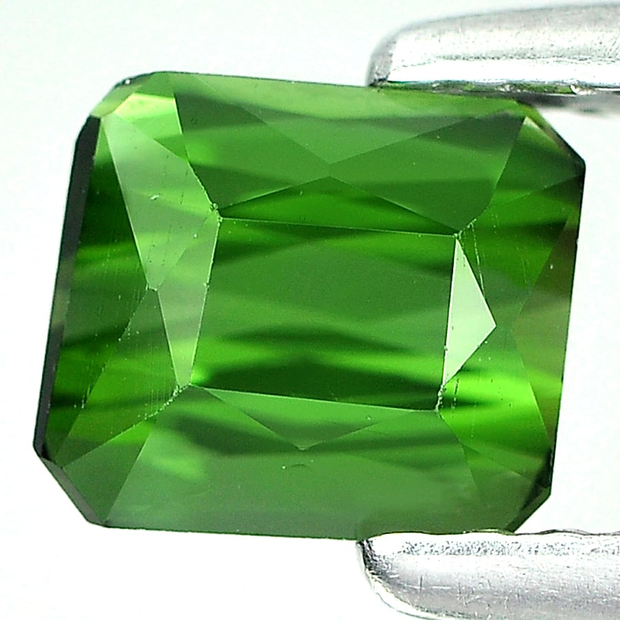 Natural Green Tourmaline Gemstones 0.95 Ct. Clean Octagon Shape 5.7 x 5 Mm.: Product ID: 807224292 Product Name: Natural Tourmaline Weight: 0.95 CT. Size: 5.7 x 5 x 3.9 MM. Shape: Octagon Color: Green Clarity:IF Luster: Good Gems Origin: Nigeria Treatment: Unheated Crystal Str