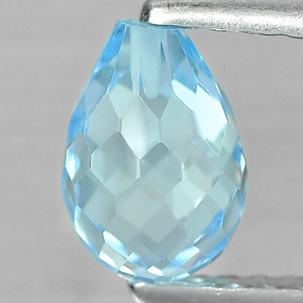 Natural Blue Topaz Gemstones 2.68 Ct. Briolette With Drilled Cut 7.3 x 5 Mm.: Product ID: 807167514 Product Name: Natural Blue Topaz Weight: 1.61 CT. Size: 7.3 x 5 MM. Shape: Briolette with Drilled Color: Blue Clarity:VSI Luster: Good Gems Origin: Brazil Treatment: Treated Crys