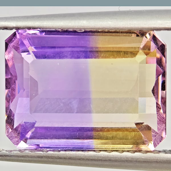 Natural Bi Color Ametrine Gemstones 4.12 Ct. Octagon Shape 11.8 x 8.8 Mm.: Product ID: 800408574 Product Name: Natural Ametrine Weight: 4.12 CT. Size: 11.8 x 8.8 x 5.8 MM. Shape: Octagon Color: Bi Color Clarity:VSI Luster: Good Gems Origin: Bolivia Treatment: Unheated Crysta