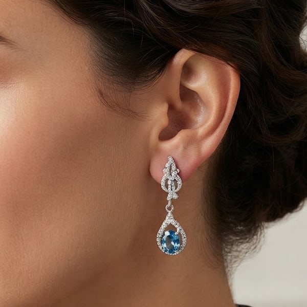 Natural London Blue Topaz with 925 Sterling Silver Earrings Jewelry 6.20 Grams: Product ID: 207102268 Product Type: 925 Sterling Silver Fine Jewelry Jewelry Weight: 6.20 Grams. Gemstones Color: Blue Metal: Solid Silver 92.5%. Gemstone Detail: London Blue Topaz Oval Size 9 x 6 mm.