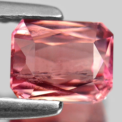 Natural Orange Pink Tourmaline Gemstones 1.23 Ct. Octagon Shape 6.4 x 5.1 Mm.: Product ID: 807230101 Product Name: Natural Tourmaline Weight: 1.23 CT. Size: 6.4 x 5.1 x 4 MM. Shape: Octagon Color: Orange Pink Clarity:VSI Luster: Good Gems Origin: Nigeria Treatment: Unheated Crys