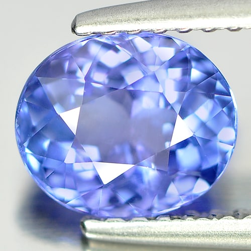 Natural Blue Tanzanite Gemstones 1.41 Ct. Clean Oval Shape 7.48 x 6.36 Mm.: Product ID: 807005415 Product Name: Natural Tanzanite Weight: 1.41 CT. Size: 7.48 x 6.36 x 4.09 MM. Shape: Oval Color: Blue Clarity:IF Luster: Very Good Gems Origin: Tanzania Treatment: Heated Crystal