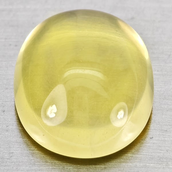 Natural Yellow Lemon Quartz Gemstones 7.70 Ct. Oval Cabochon Shape 11.9 x 14.4 Mm.: Product ID: 805530085 Product Name: Natural Quartz Weight: 7.70 CT. Size: 11.9 x 14.4 x 6.4 MM. Shape: Oval Cabochon Color: Yellow Lemon Clarity:Semi - Transparent Luster: Good Gems Origin: Brazil Tre