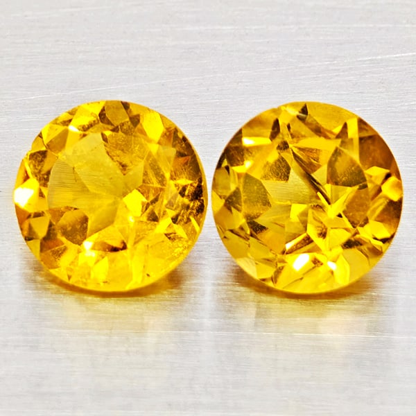 Natural Yellow Citrine Gemstones 2.53 Ct. 2 Pcs. Round Shape 7.1 Mm.: Product ID: 801815359 Product Name: Natural Citrine Weight: 2.53 CT. Size: 7.1 x 7.1 x 4.5 MM. Shape: Round Shape Color: Yellow Clarity:VSI - SI1 Luster: Good Gems Origin: Brazil Treatment: Unheated C