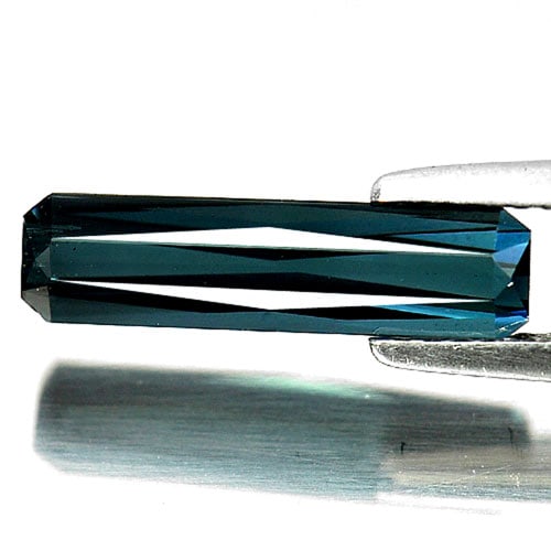 Natural Blue Indicolite Tourmaline Gemstones 1.88 Ct. Octagon Shape 14.6 x 4 Mm.: Product ID: 807239800 Product Name: Natural Tourmaline Weight: 1.88 CT. Size: 14.6 x 4 x 3.4 MM. Shape: Octagon Color: Blue Indicolite Clarity:VS Luster: Very Good Gems Origin: Nigeria Treatment: Unhe
