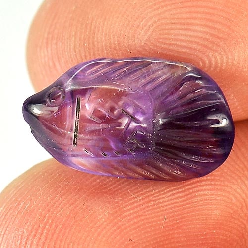 Natural Violet Amethyst Gemstones 4.66 Ct. Fish Carving Shape 16.2 x 9.6 Mm.: Product ID: 810303720 Product Name: Natural Amethyst Weight: 4.66 CT. Size: 16.2 x 9.6 x 5.7 MM. Shape: Fish Carving Color: Violet Clarity:Semi - Transparent Luster: Good Gems Origin: Brazil Treatment
