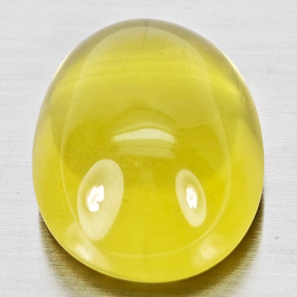 Natural Yellow Lemon Quartz Gemstones 31.33 Ct. Oval Cabochon Shape 26 x 17.2 Mm.: Product ID: 805529993 Product Name: Natural Quartz Weight: 31.33 CT. Size: 26 x 17.2 x 10 MM. Shape: Oval Cabochon Color: Yellow Lemon Clarity:Semi - Transparent Luster: Good Gems Origin: Brazil Treat