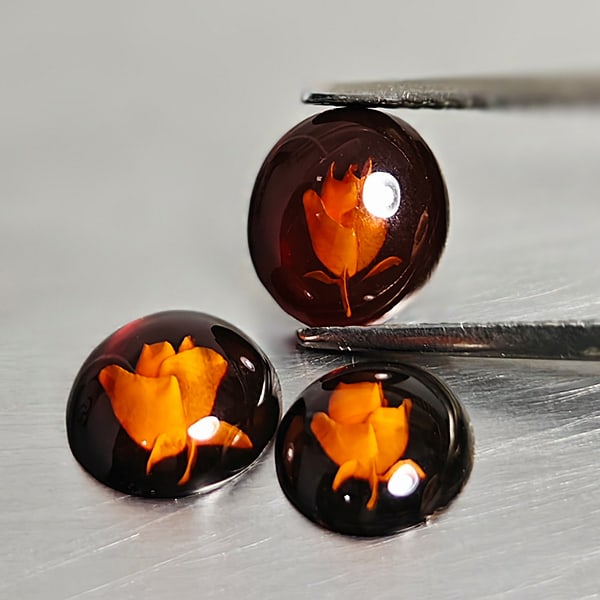 Natural Brown Yellow Amber emstones 1.33 Ct. 3 Pcs. Flower Carving Shape 8.8 x 7.7 Mm.: Product ID: 819091012 Product Name: Natural Amber Weight: 1.33 CT. Size: 8.8 x 7.7 x 3.1 MM. Shape: Oval Cabochon Color: Brown Yellow Clarity:Semi - Transparent Luster: Good Gems Origin: Poland Treatm