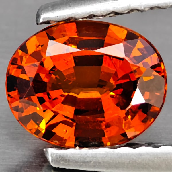 Natural Orange Spessartine Garnet Gemstones 0.85 Ct. Oval Shape 6.7 x 5.3 Mm.: Product ID: 802937835 Product Name: Natural Spessartine Weight: 0.85 CT. Size: 6.7 x 5.3 x 3.4 MM. Shape: Oval Shape Color: Orange Clarity:VSI Luster: Good Gems Origin: Namibia Treatment: Unheated Cry