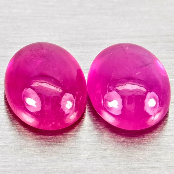 Natural Pink Red Jonson Ruby Gemstones 1.07 Ct. 2 Pcs. Oval Cabochon Shape 5.1 x 4.2 Mm.: Product ID: 805935783 Product Name: Natural Ruby Weight: 1.07 CT. Size: 5.1 x 4.2 x 2.5 MM. Shape: Oval Cabochon Color: Pink Red Clarity:Semi - Transparent Luster: Good Gems Origin: Mozambique Treatme